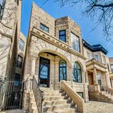 a view of a building with a street