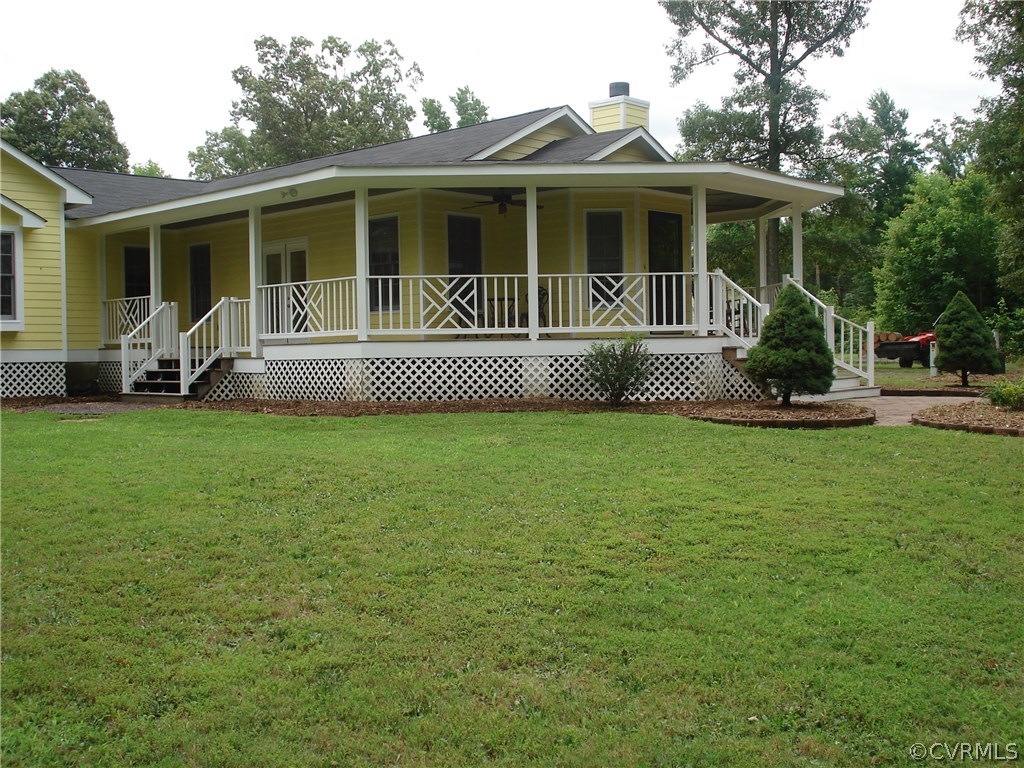 31255 Millers Crossing Road Hanover, VA 23069 - Photo 3 of 44 View of covered front porch with Chippendale raili