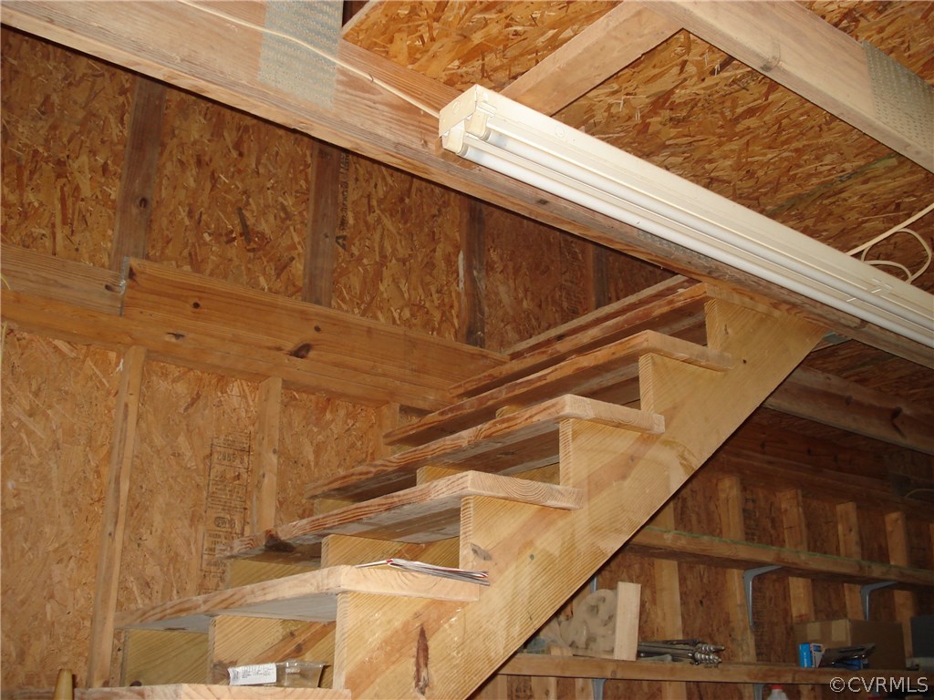 31255 Millers Crossing Road Hanover, VA 23069 - Photo 43 of 44 Steps up to floored storage area in garage