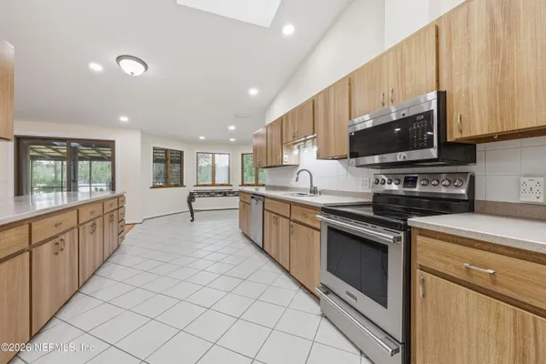 a view of a living room that has a fireplace