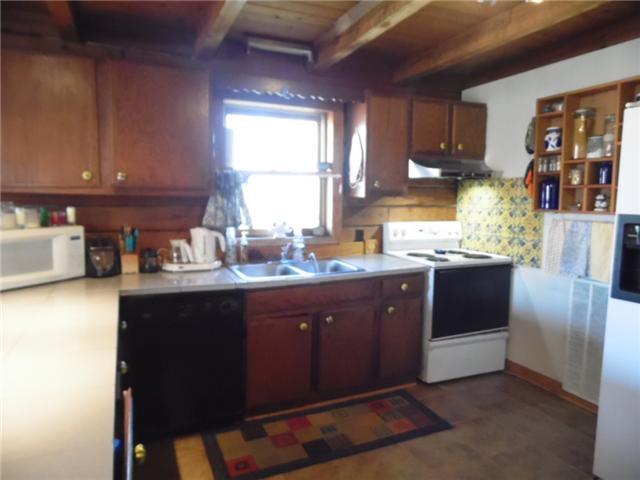 33 Whitsett Road Nashville, TN 37210 - Photo 5 of 17 Kitchen with stove, dishwasher and tiled floors
