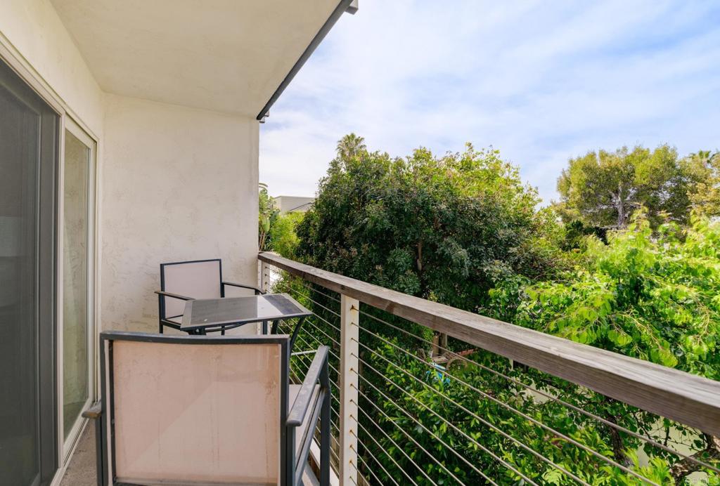 935 Genter Street, Unit 212 La Jolla, CA 92037 - Photo 8 of 23 a balcony view with two chairs and a table
