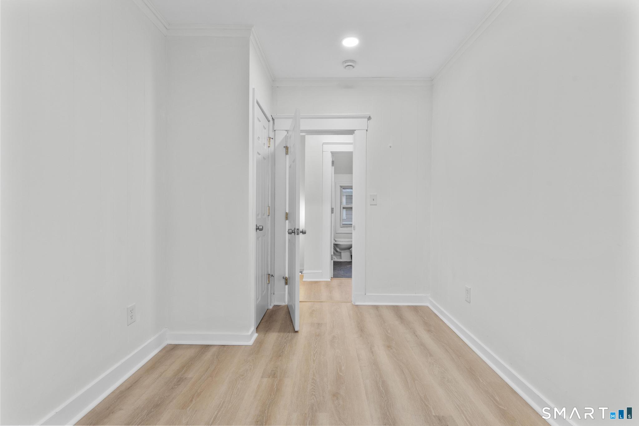 141 Augur Street Hamden, CT 06517 - Photo 8 of 25 a view of a room with wooden floor
