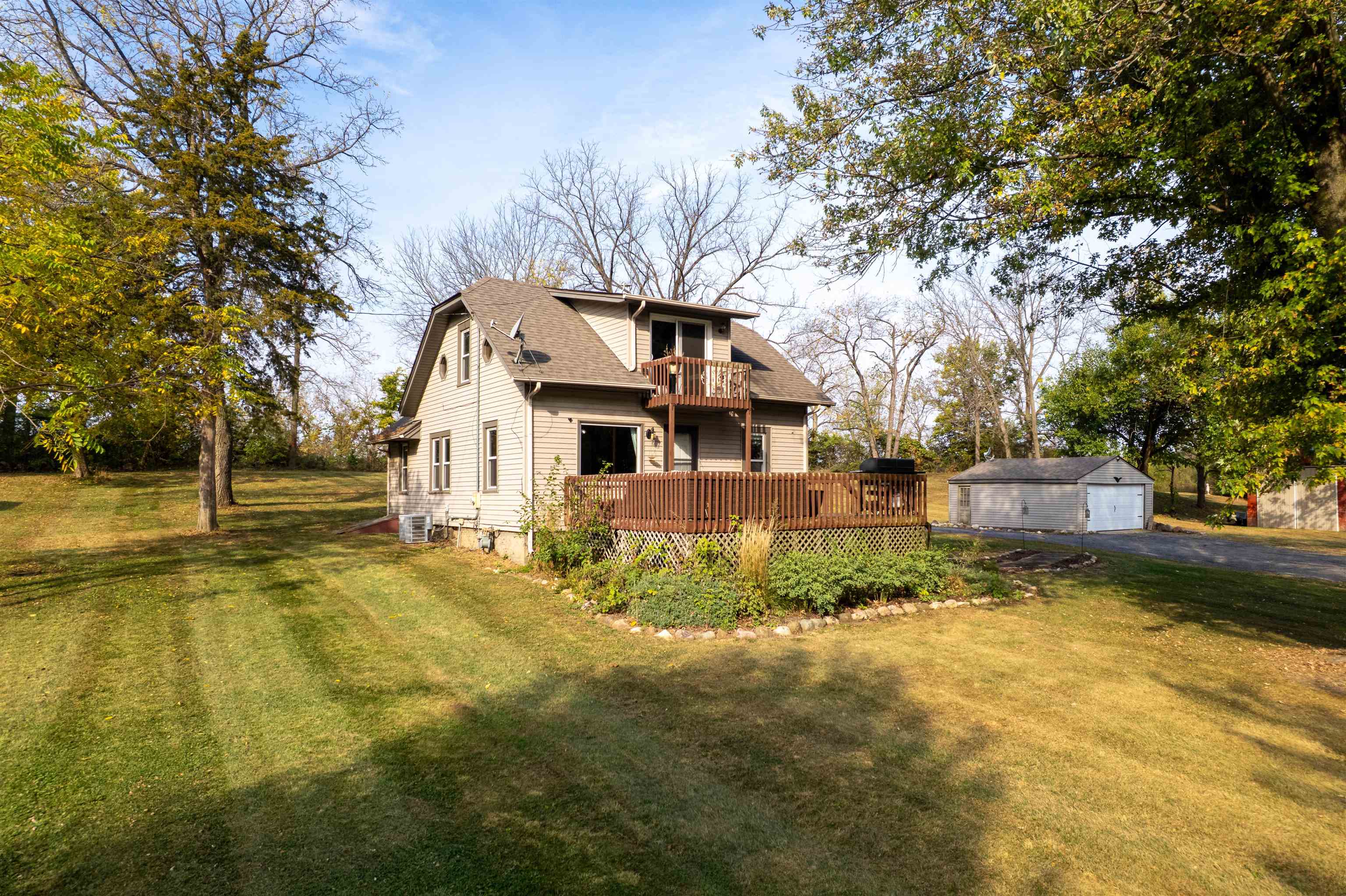 6155 South Perryville Road Cherry Valley, IL 61016 - Photo 23 of 92 a front view of house with yard