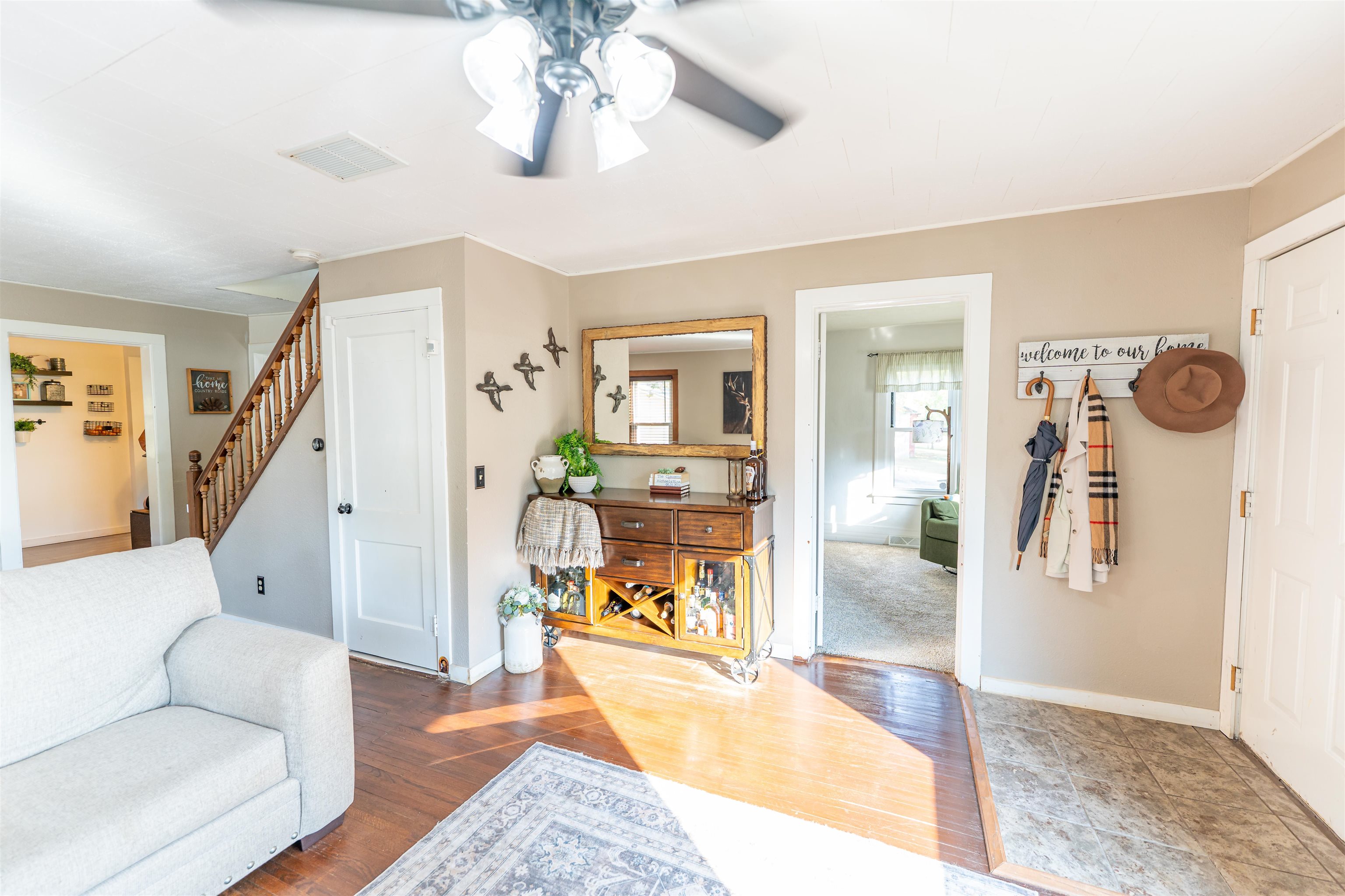 6155 South Perryville Road Cherry Valley, IL 61016 - Photo 41 of 92 a living room with furniture and a wooden floor