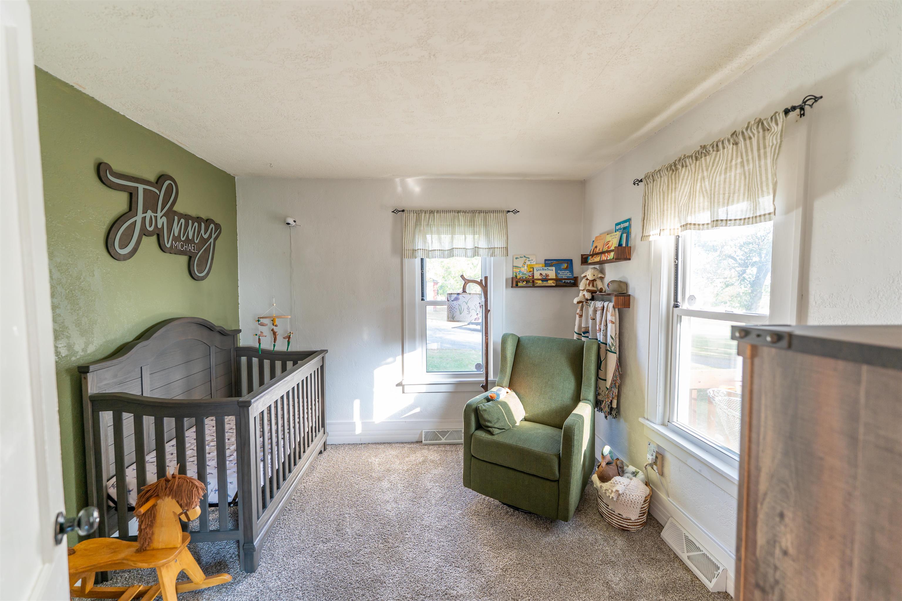 6155 South Perryville Road Cherry Valley, IL 61016 - Photo 42 of 92 a living room with furniture and a window