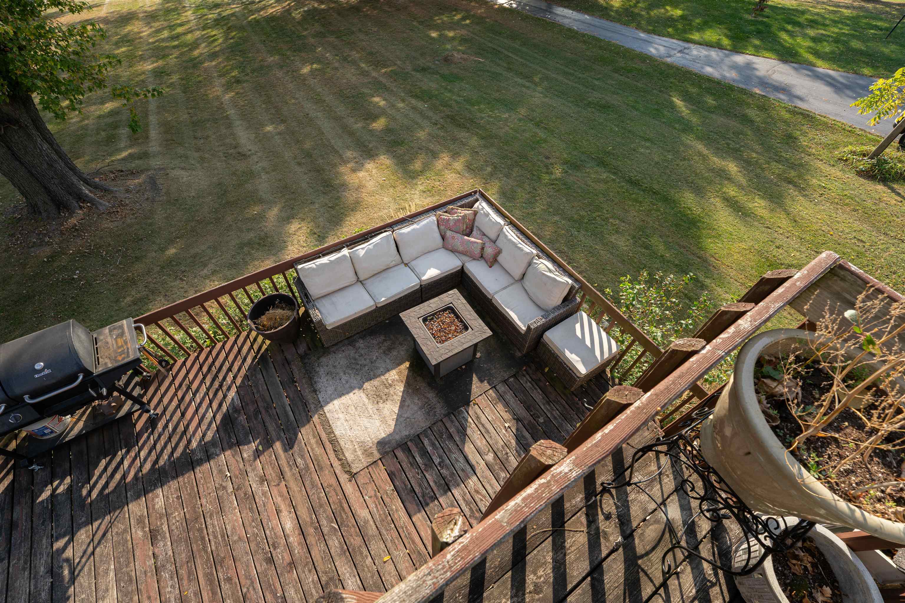 6155 South Perryville Road Cherry Valley, IL 61016 - Photo 56 of 92 a view of a balcony with wooden floor and outdoor seating