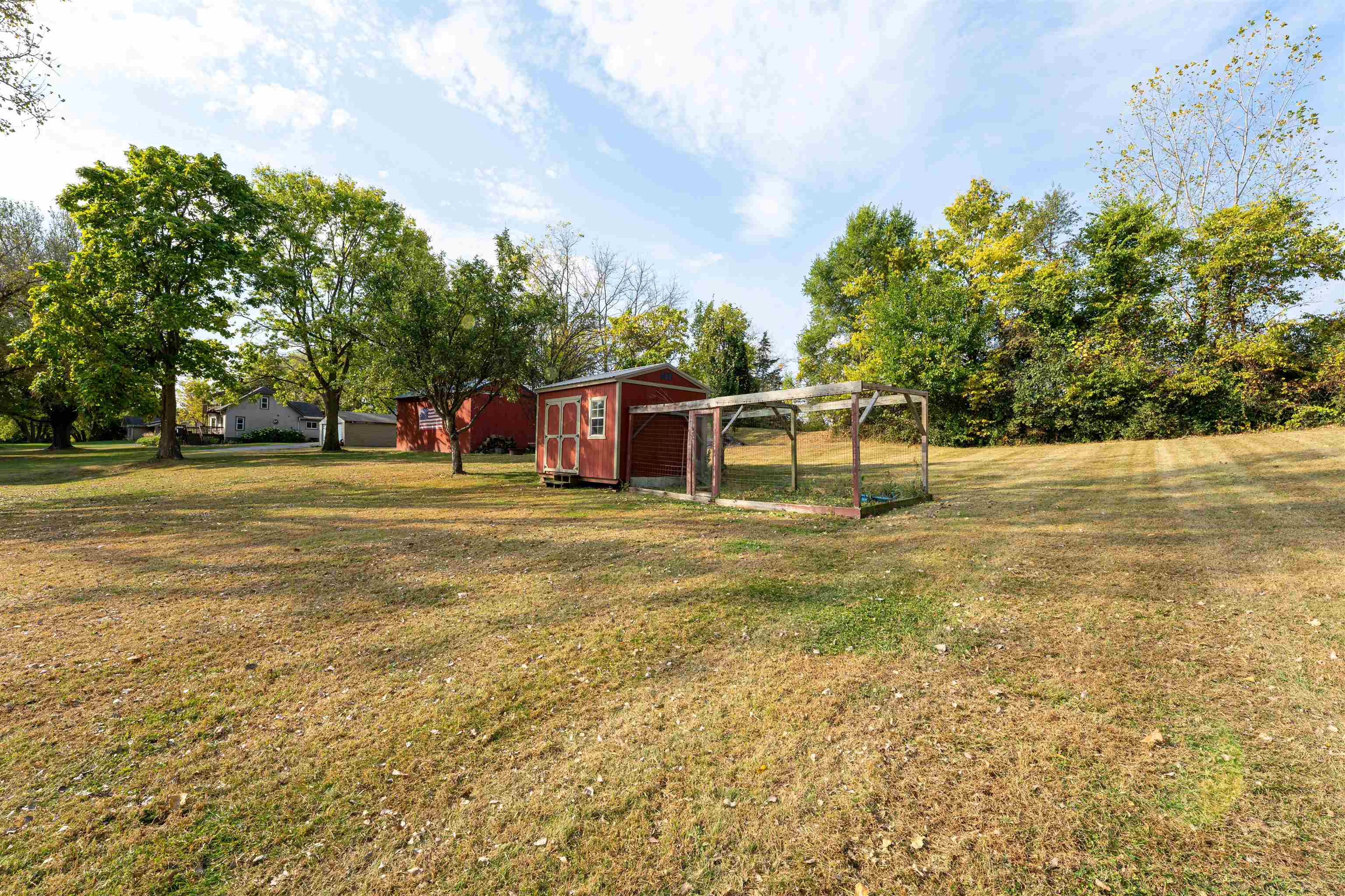6155 South Perryville Road Cherry Valley, IL 61016 - Photo 81 of 92 a view of a house with a yard