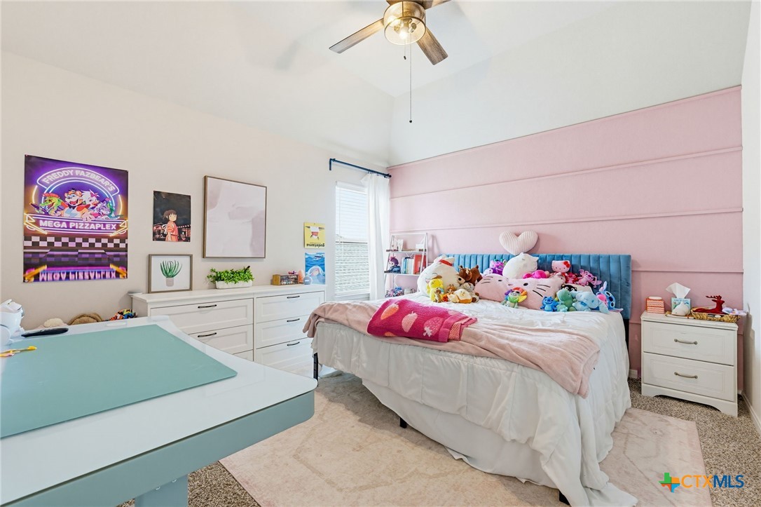 1761 Spence Street Temple, TX 76502 - Photo 18 of 30 a bedroom with a bed and a window