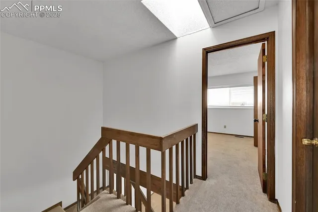 a view of a house with backyard and porch