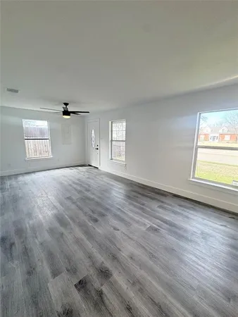a view of an empty room and window
