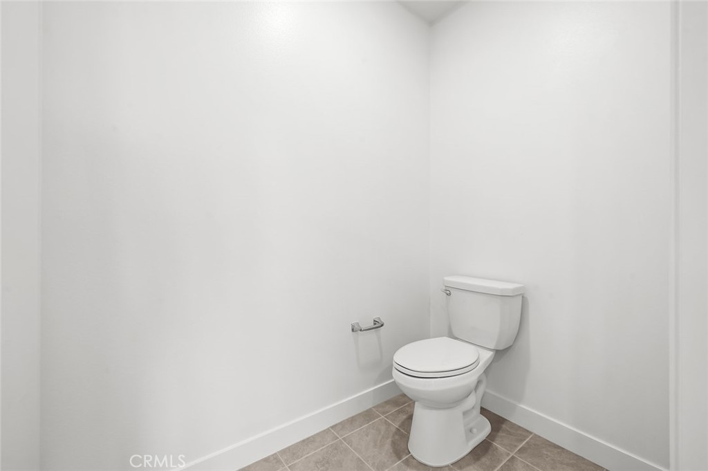 3604 Rivington Irvine, CA 92612 - Photo 23 of 54 a bathroom with a toilet and a sink