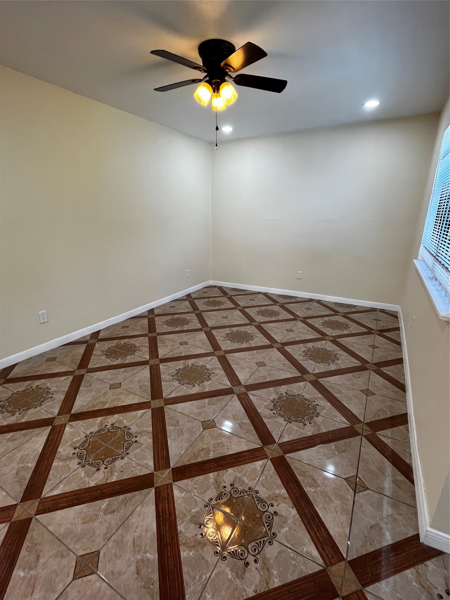 3163 Roe Drive Houston, TX 77087 - Photo 28 of 47 a bedroom with a bed and a chandelier