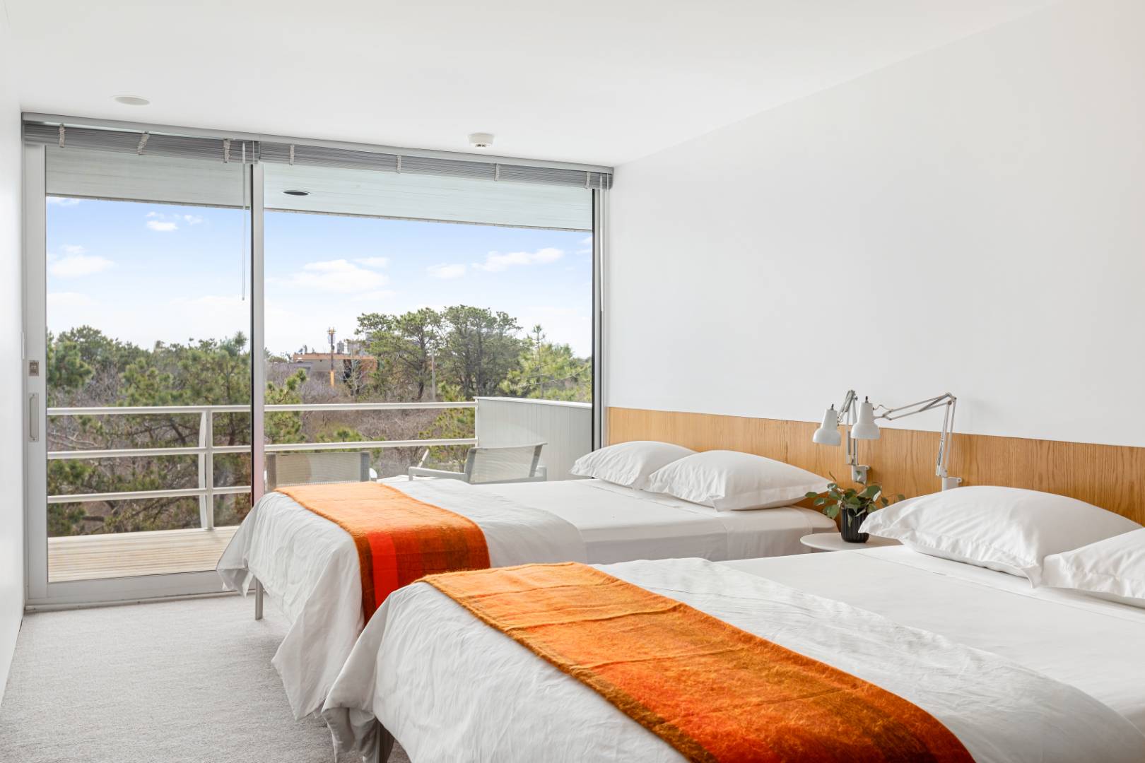 43 Gilberts Path Amagansett, NY 11930 - Photo 25 of 38 a bedroom with two beds and a large window