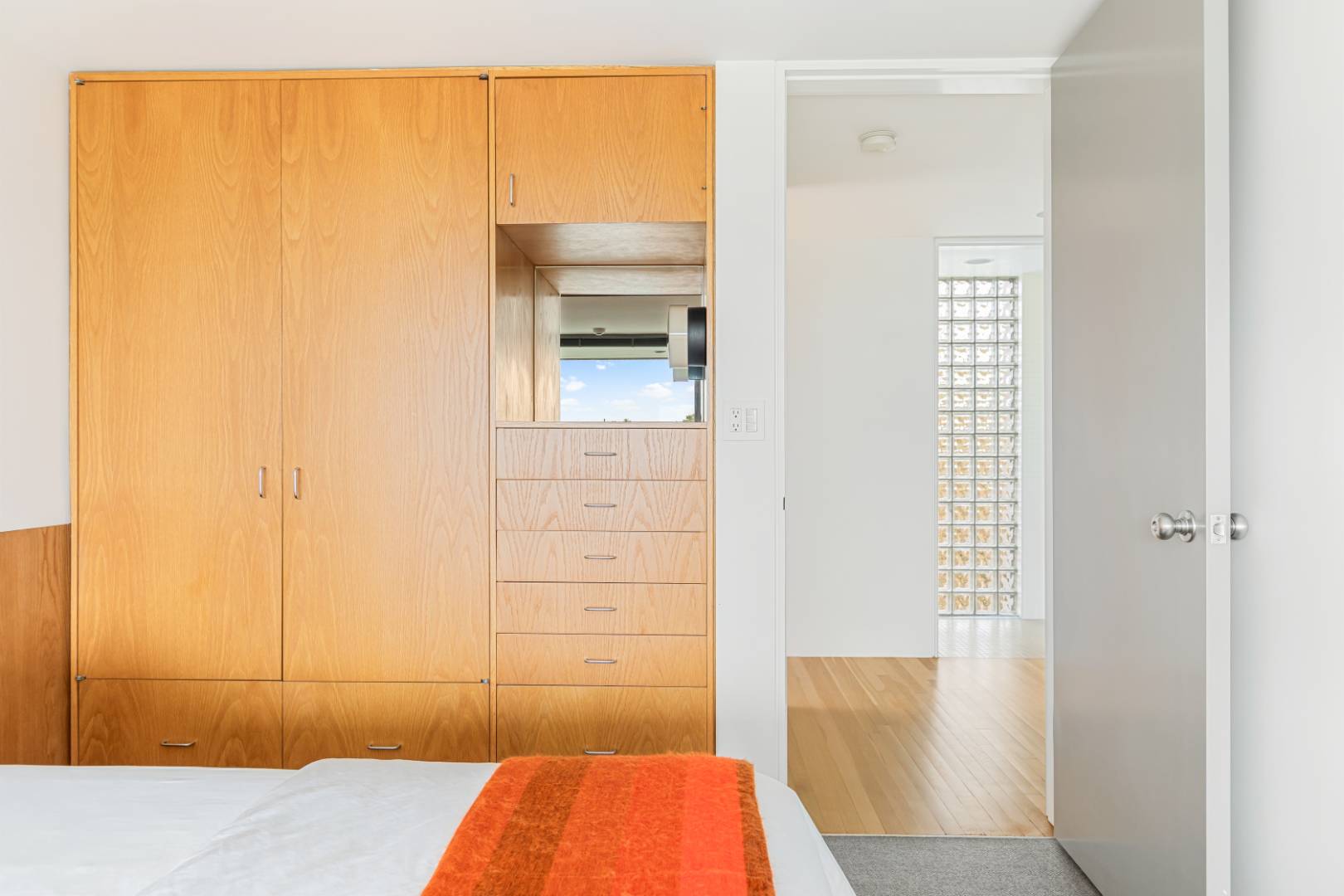 43 Gilberts Path Amagansett, NY 11930 - Photo 26 of 38 a bedroom with a bed and a wooden floor