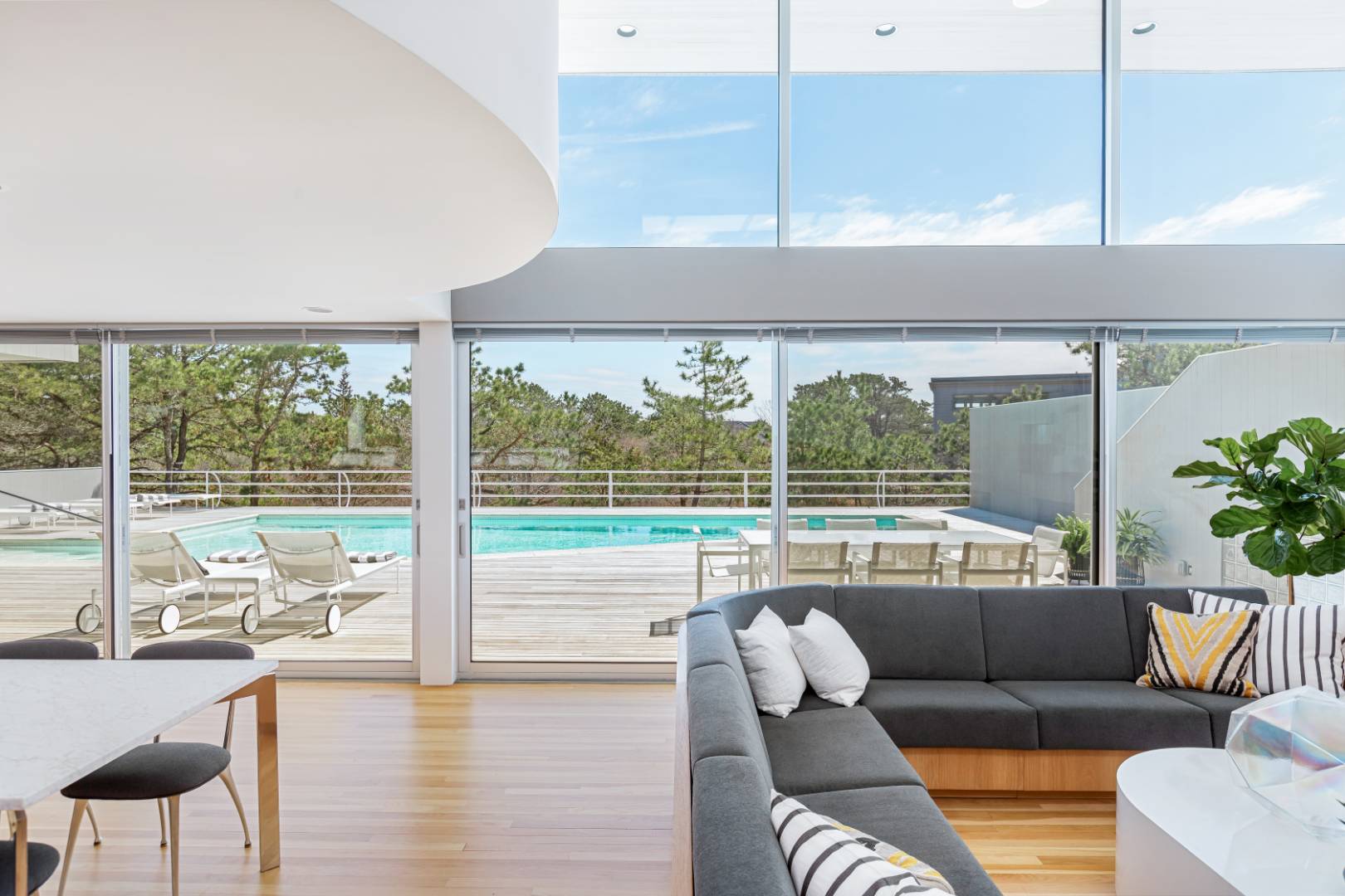 43 Gilberts Path Amagansett, NY 11930 - Photo 5 of 38 a living room with furniture and a large window