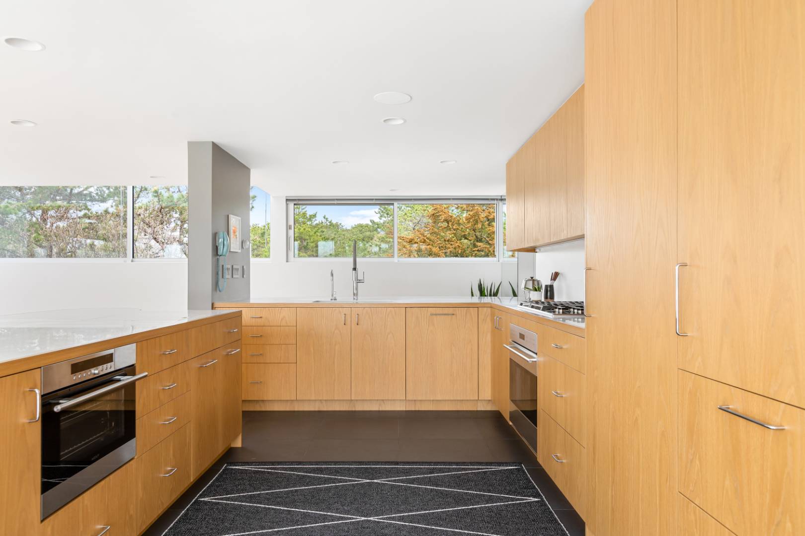 43 Gilberts Path Amagansett, NY 11930 - Photo 10 of 38 a bathroom with a tub sink and window