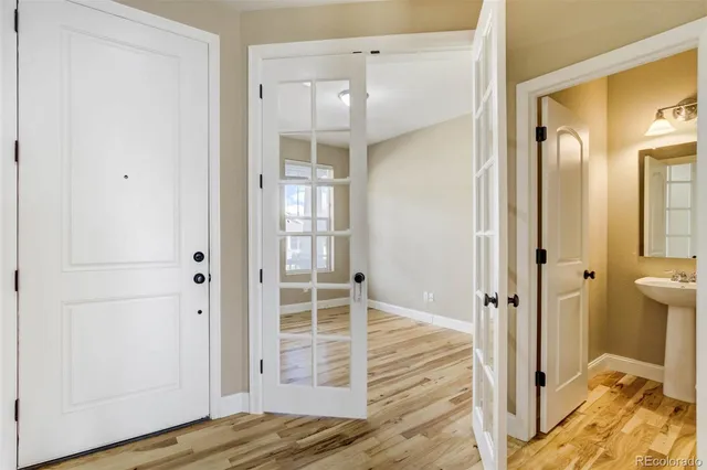 a view of a bathroom with a tub and shower