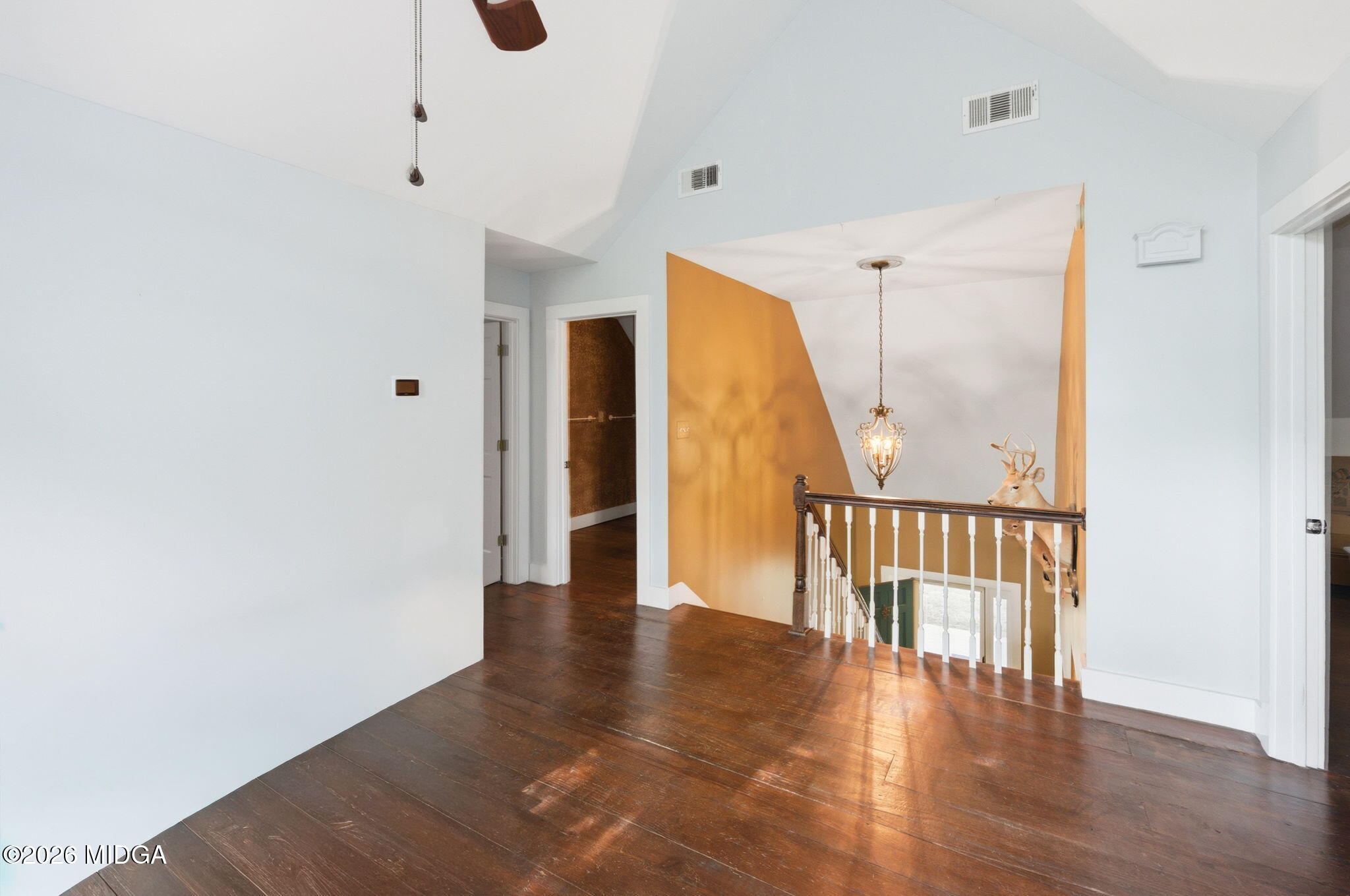 4686 Johnstonville Road Forsyth, GA 31029 - Photo 23 of 34 a view of an entryway with wooden floor