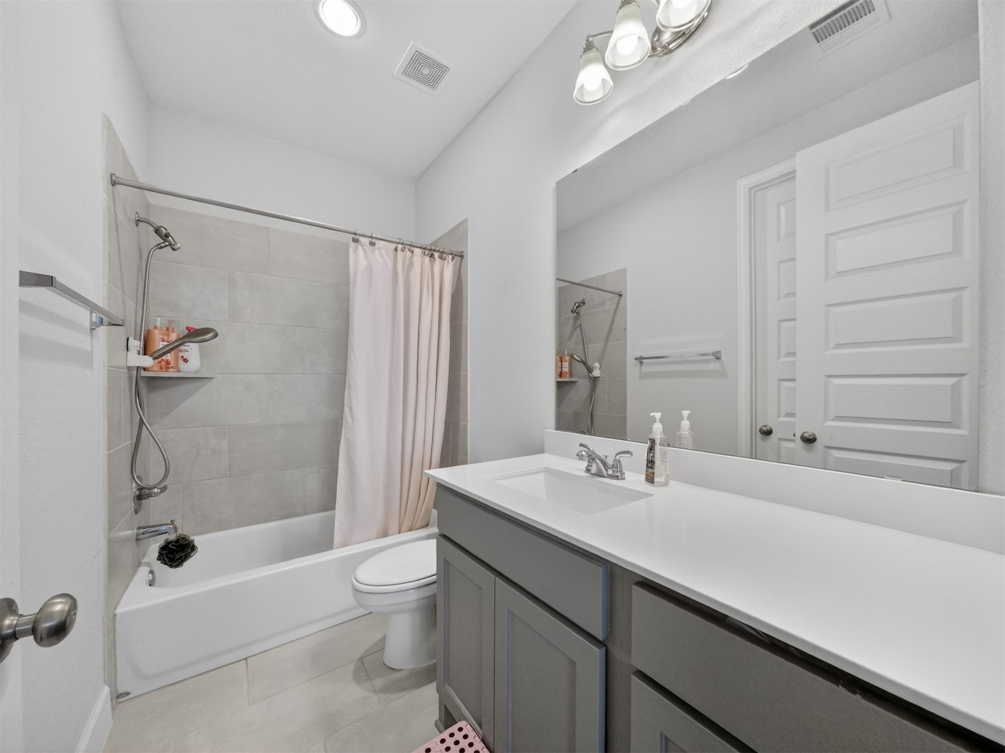 4343 Martin Ridge Drive Manvel, TX 77578 - Photo 24 of 50 a bathroom with a sink a toilet and shower
