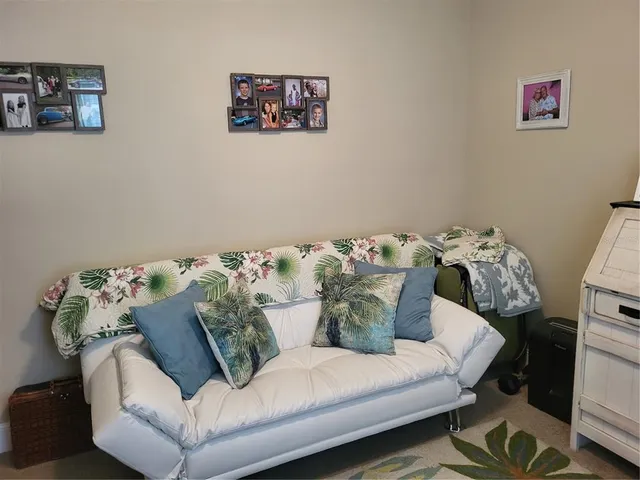 a living room with furniture and a couch