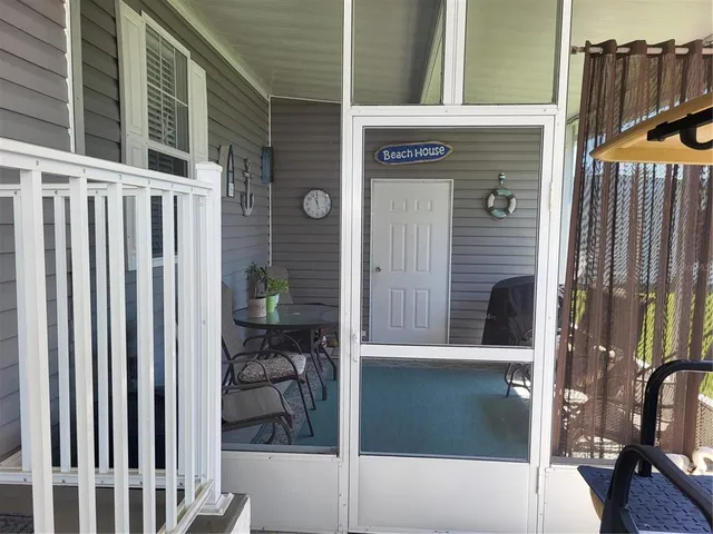 a view of a chairs room with two chairs and a table