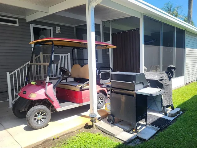 a view of a dinning room with furniture and window