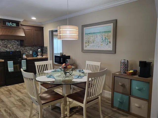 a view of a dining room with furniture