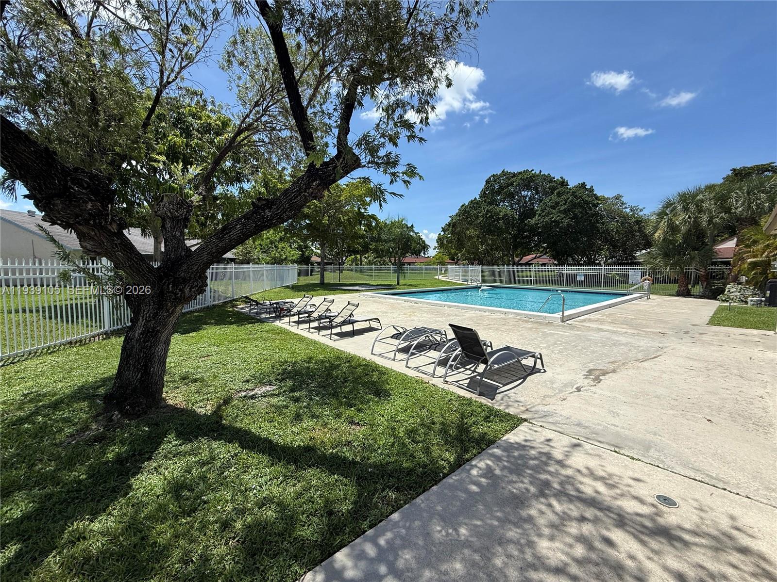 7808 Northwest 60th Street Tamarac, FL 33321 - Photo 13 of 26 a view of a backyard