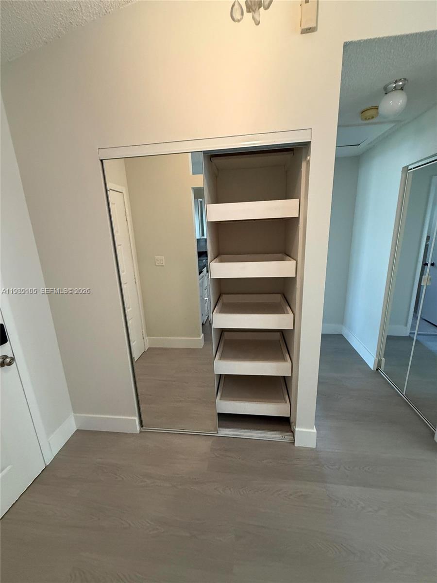 7808 Northwest 60th Street Tamarac, FL 33321 - Photo 15 of 26 a view of room with white door and door