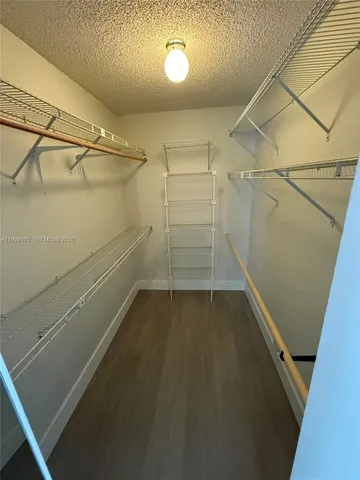 a view of empty room with windows