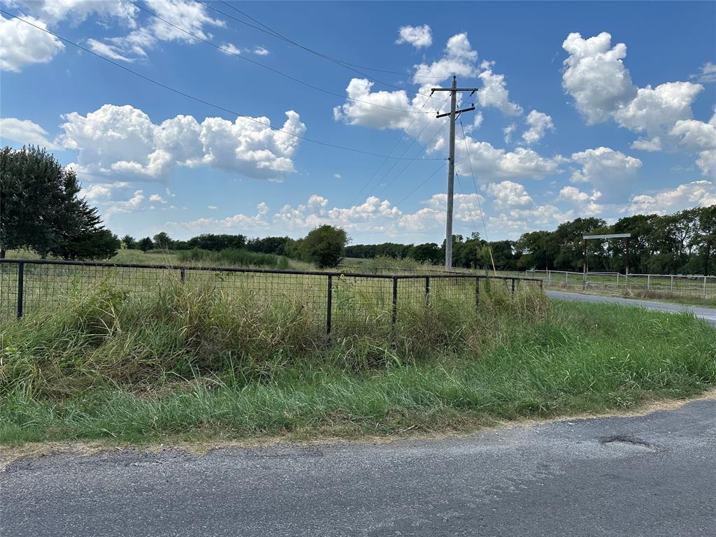 Lot 8 Eastline Road Whitewright, TX 75491 - Photo 12 of 19 View of asphalt street with a view of rural / pastoral area