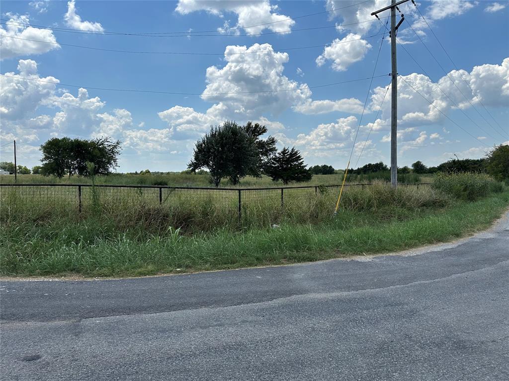 Lot 8 Eastline Road Whitewright, TX 75491 - Photo 14 of 19 View of asphalt road featuring a view of countryside