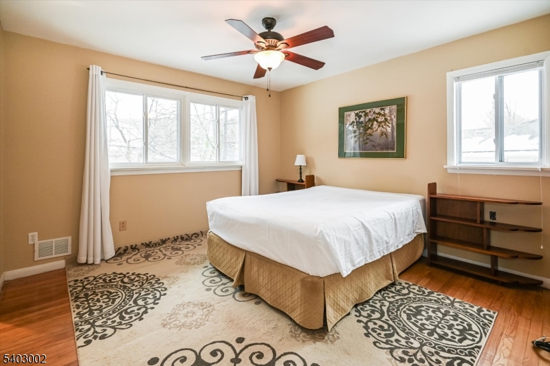 45 Indian Road Wayne, NJ 07470 - Photo 17 of 30 a bedroom with a bed and a window