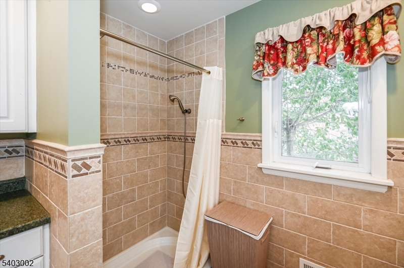 45 Indian Road Wayne, NJ 07470 - Photo 23 of 30 a bathroom with a shower