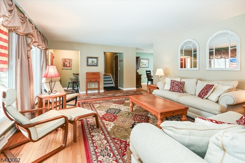 45 Indian Road Wayne, NJ 07470 - Photo 3 of 30 a living room with furniture and a large window