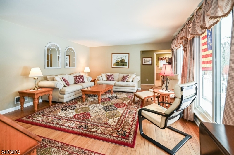 45 Indian Road Wayne, NJ 07470 - Photo 5 of 30 a living room with furniture and a window