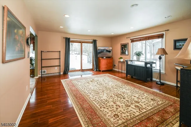 a living room with stainless steel furniture or couch and a table