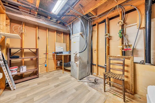 a view of a porch with furniture and a yard