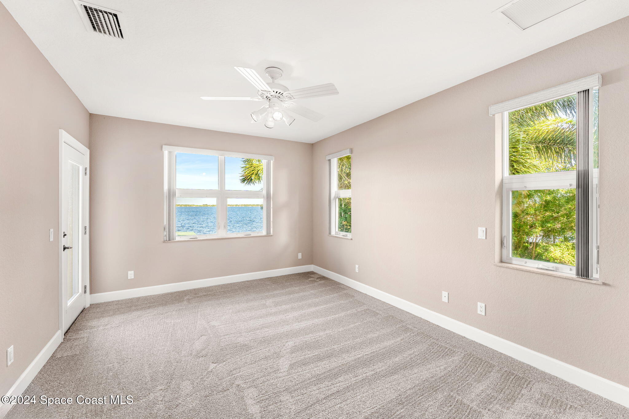 1600 Elm Drive West Melbourne, FL 32935 - Photo 28 of 79 a view of an empty room with a window