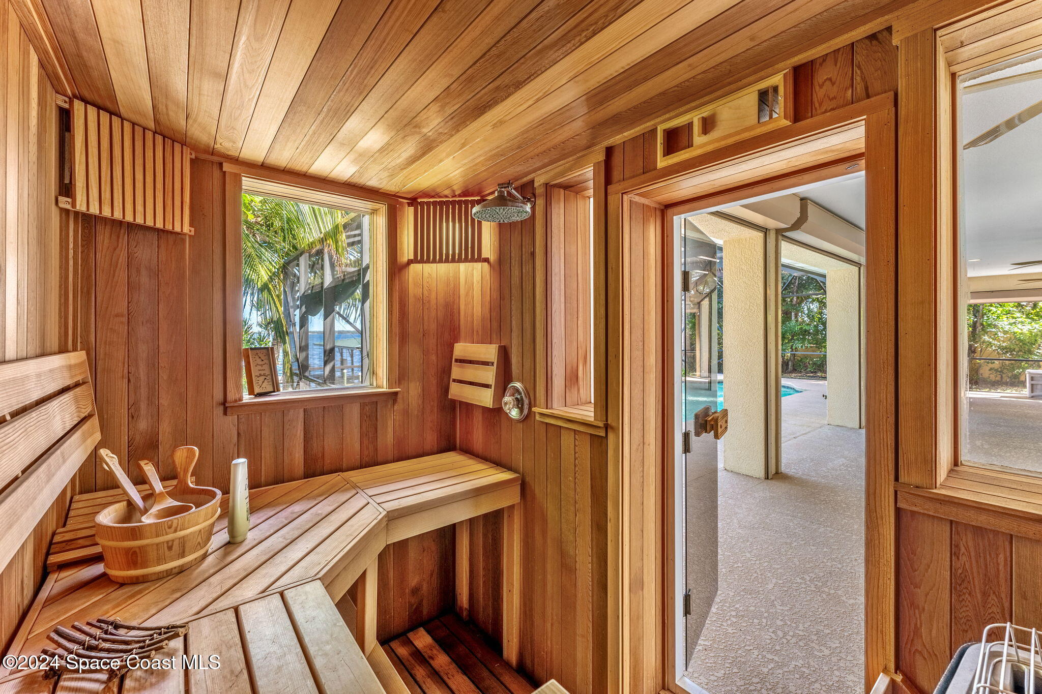 1600 Elm Drive West Melbourne, FL 32935 - Photo 39 of 79 a bedroom with a bed and wooden floor