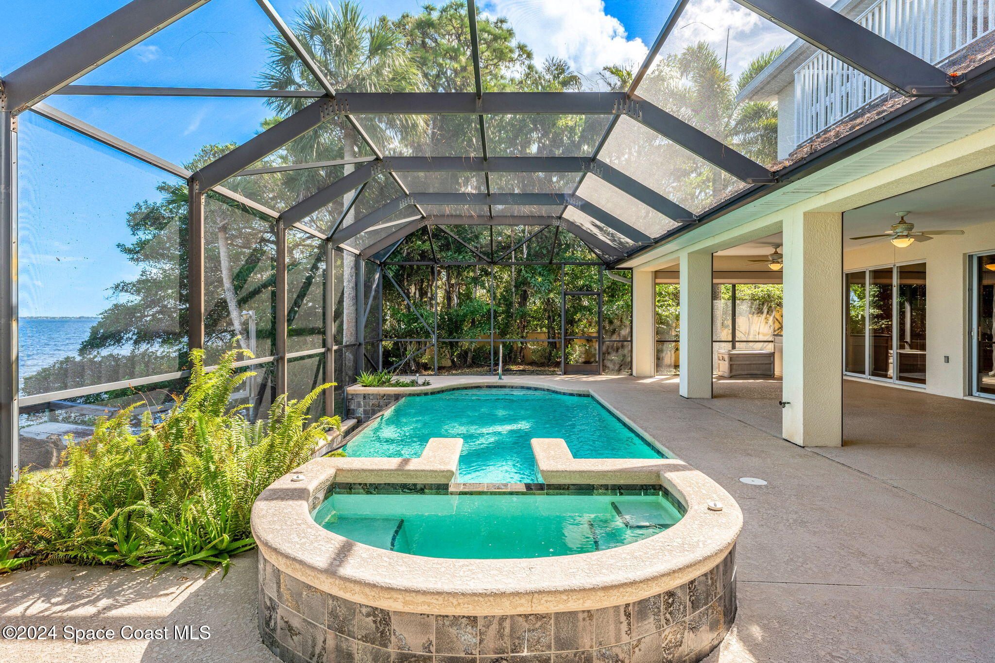 1600 Elm Drive West Melbourne, FL 32935 - Photo 43 of 79 a view of a backyard with table and chairs potted plants