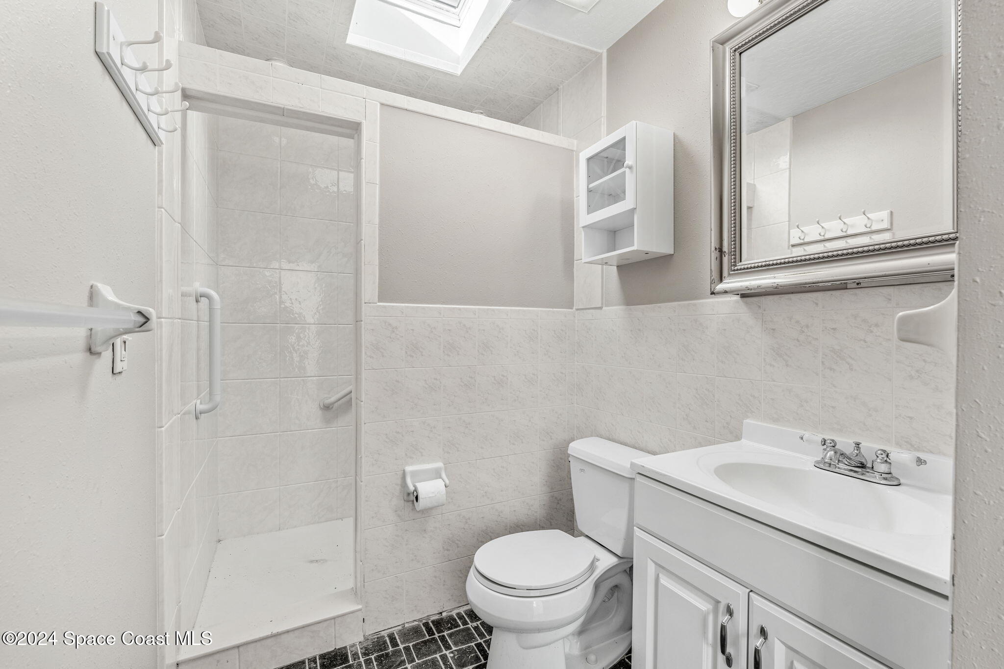 1600 Elm Drive West Melbourne, FL 32935 - Photo 51 of 79 a bathroom with a sink a toilet and shower