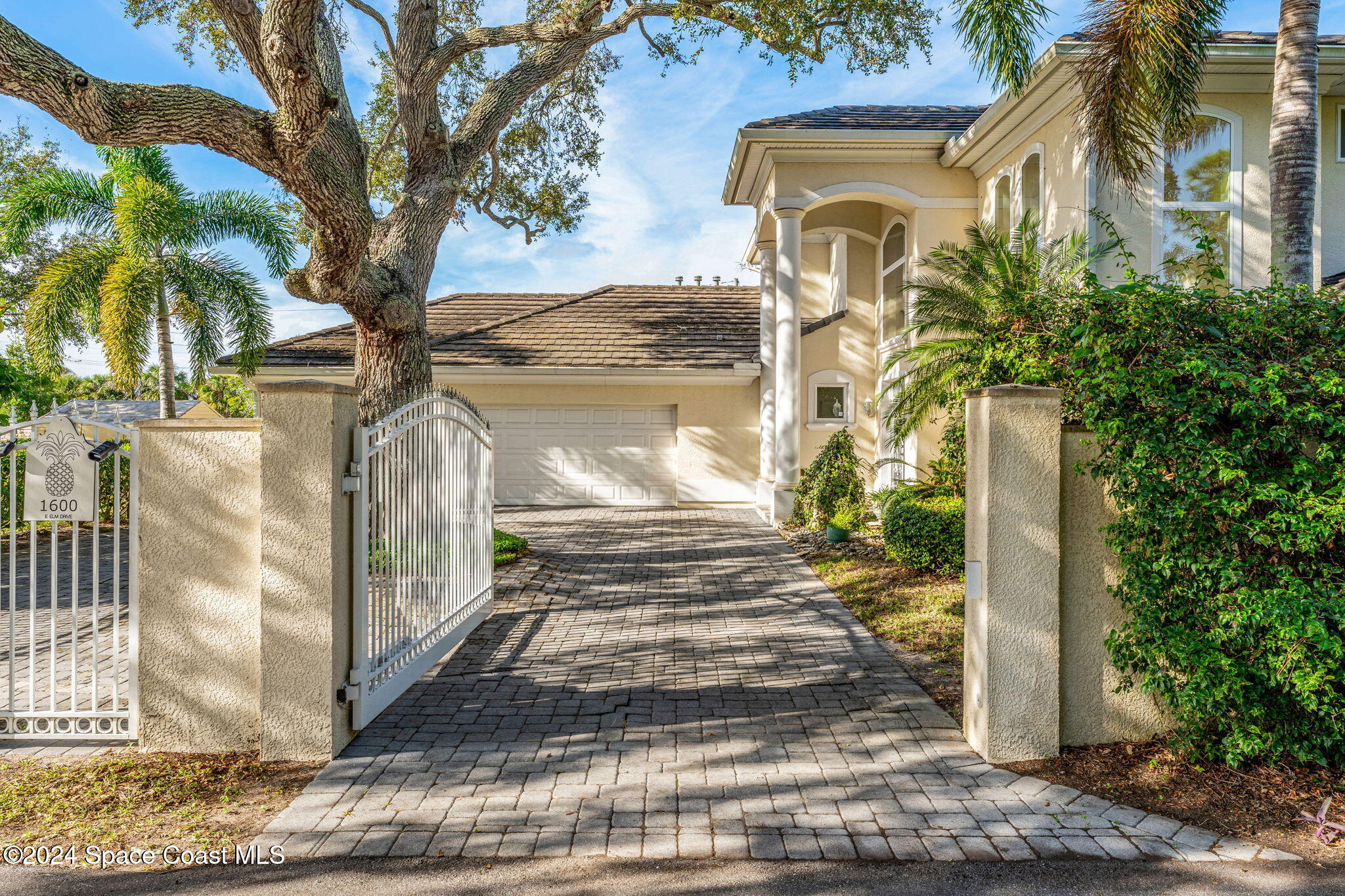 1600 Elm Drive West Melbourne, FL 32935 - Photo 74 of 79 a front view of a house with a tree
