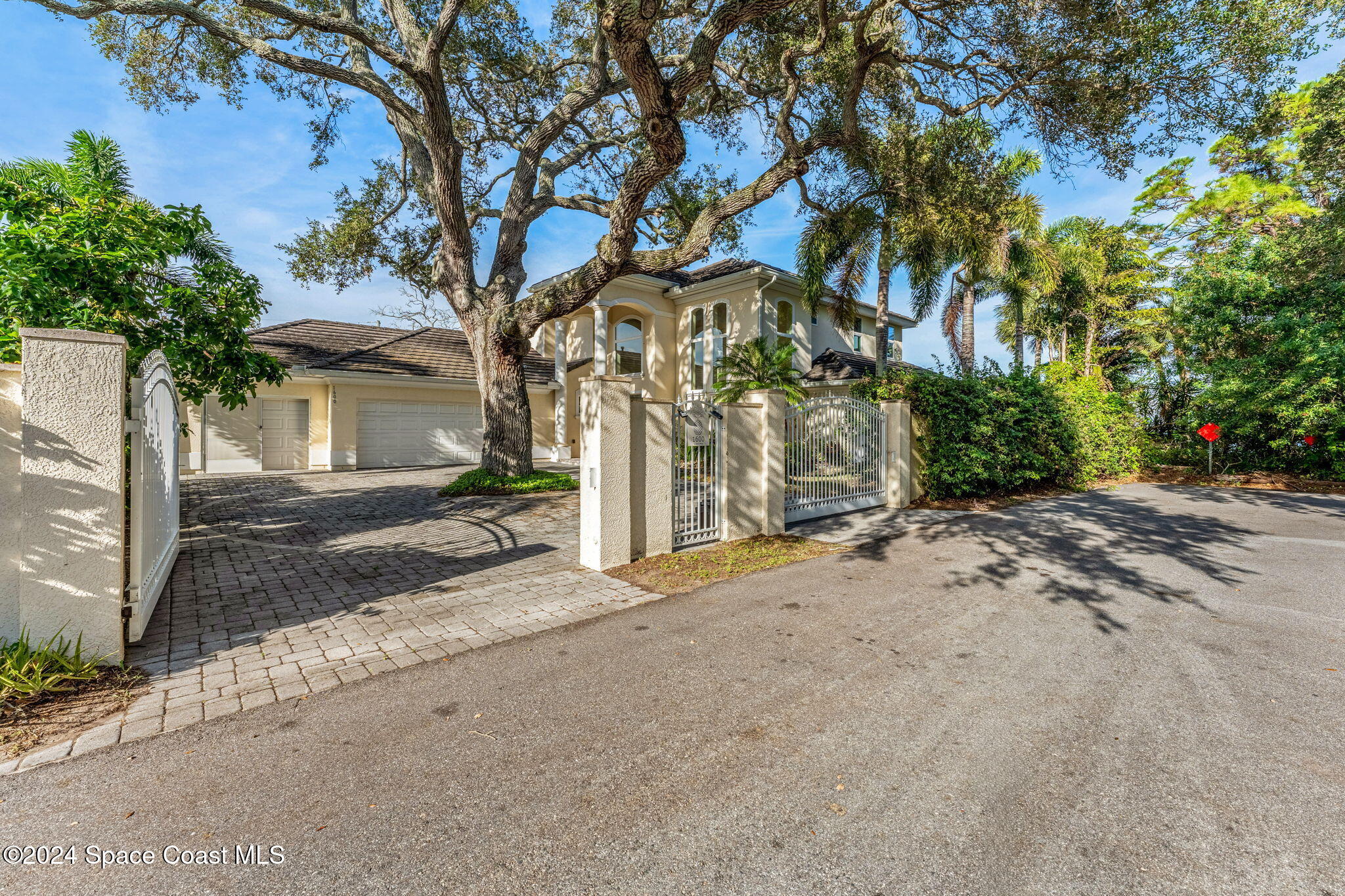 1600 Elm Drive West Melbourne, FL 32935 - Photo 75 of 79 a view of a house with a tree and a tree