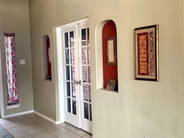 a view of front door with hallway
