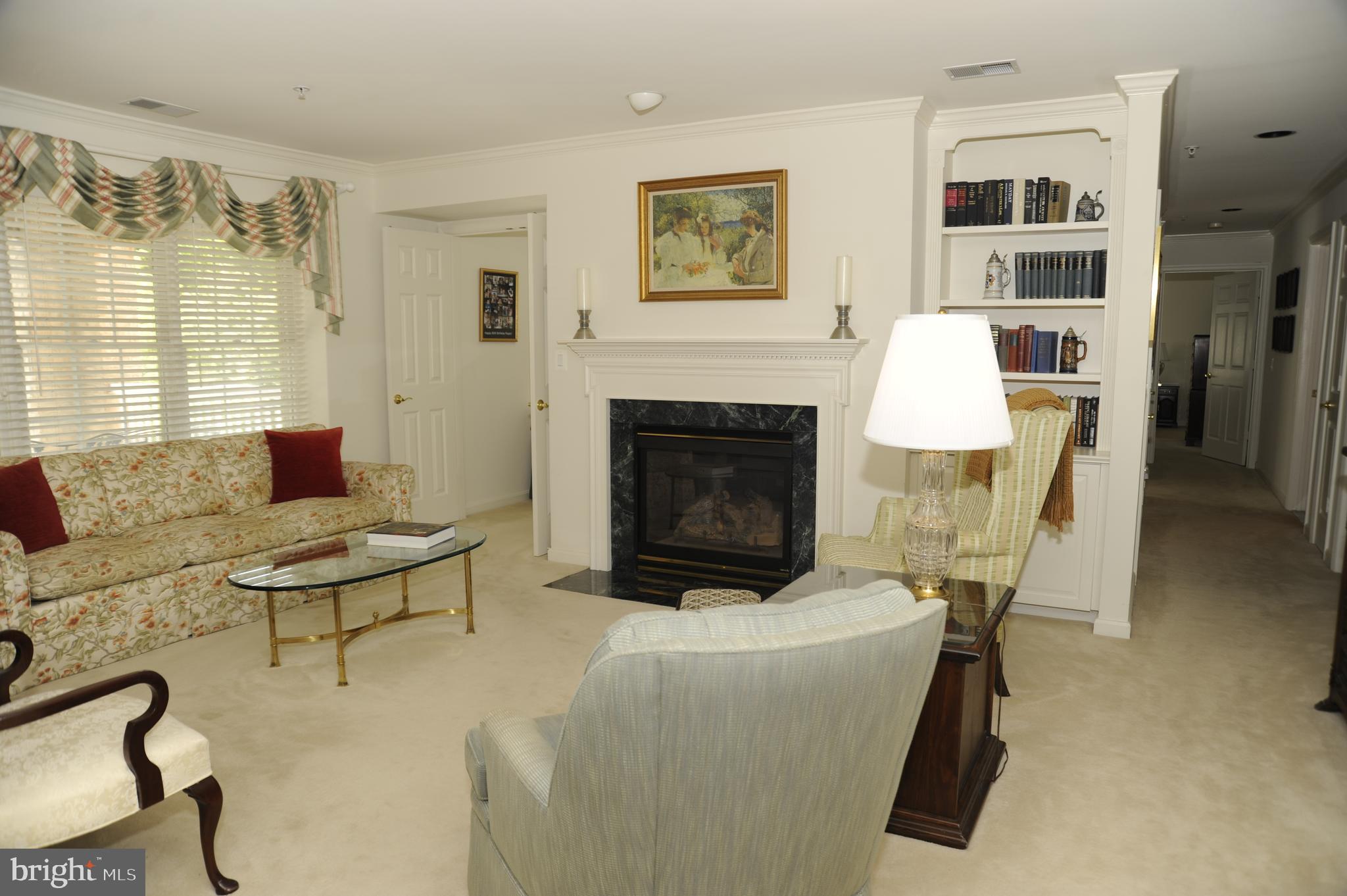 12330 Rosslare Ridge Road, Unit 408 Lutherville-Timonium, MD 21093 - Photo 14 of 35 Built-in book shelves in living room!
