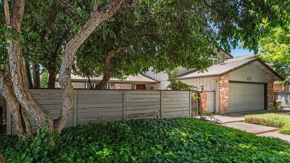 2112 Spring Oak Court Modesto, CA 95355 - Photo 1 of 1 2112 Spring Oak Court welcomes you with a lovely shade tree