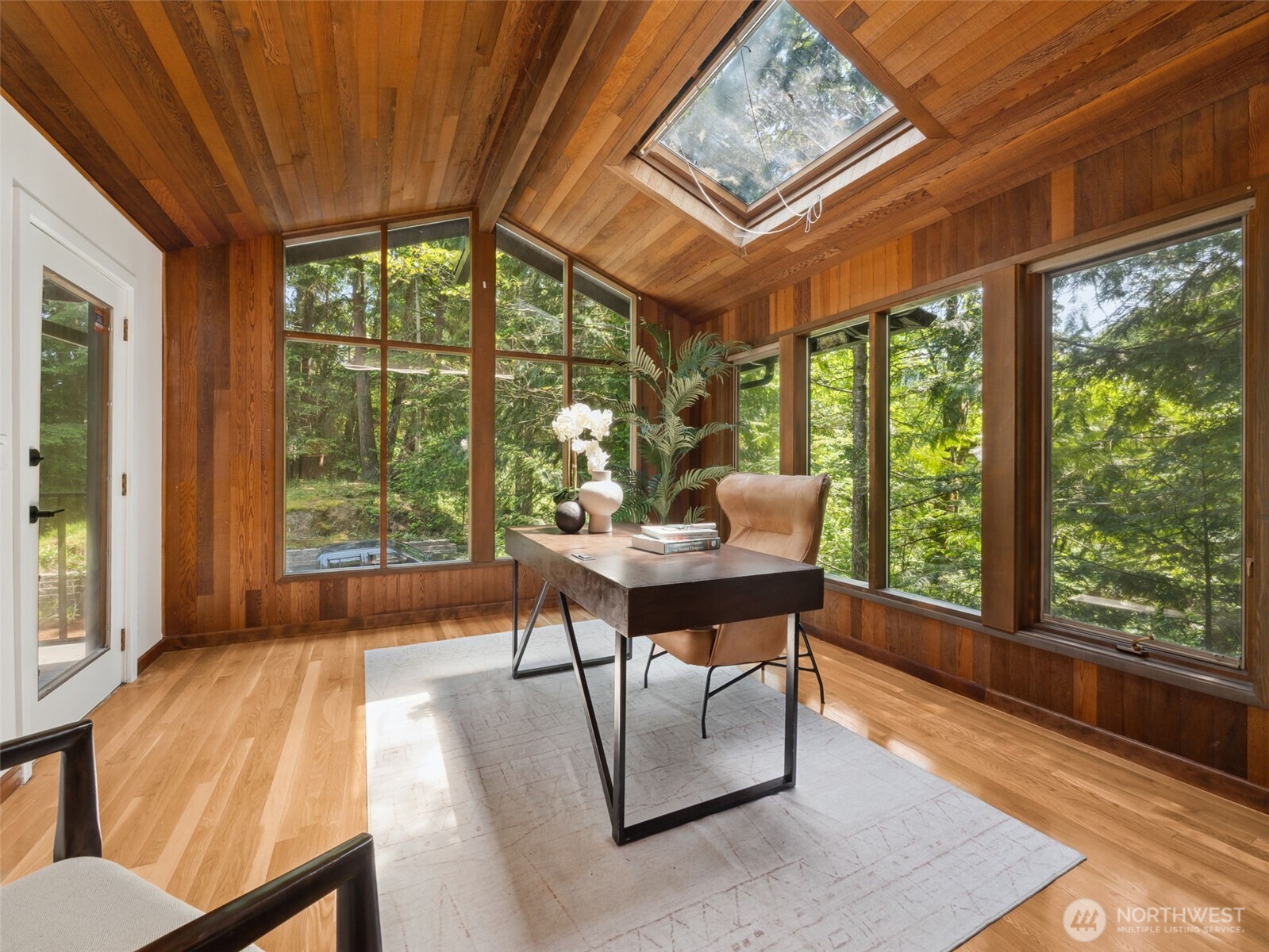 6423 East Mercer Way Mercer Island, WA 98040 - Photo 13 of 39 a living room with furniture and a floor to ceiling window