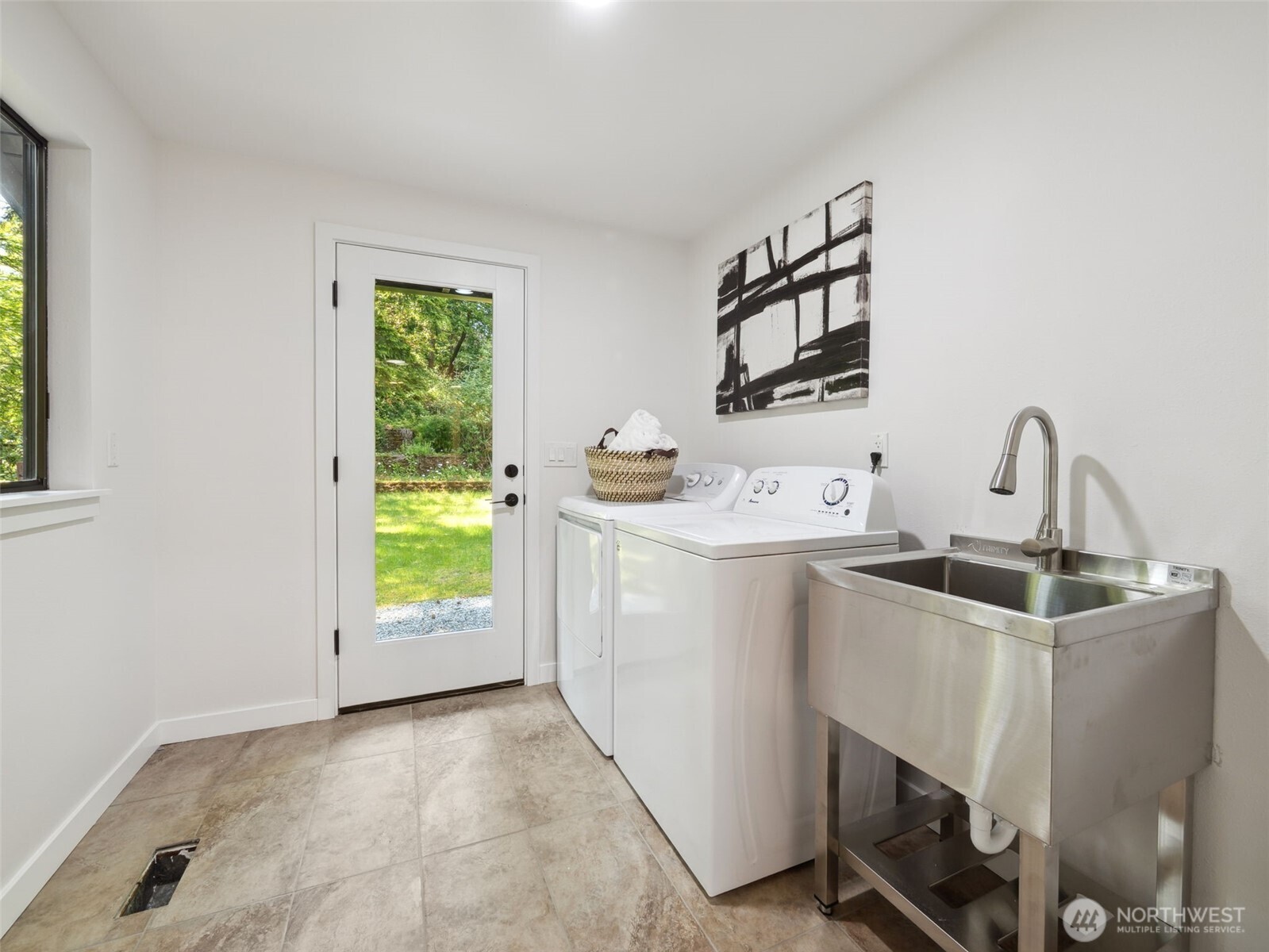 6423 East Mercer Way Mercer Island, WA 98040 - Photo 15 of 39 a room with a sink and a window